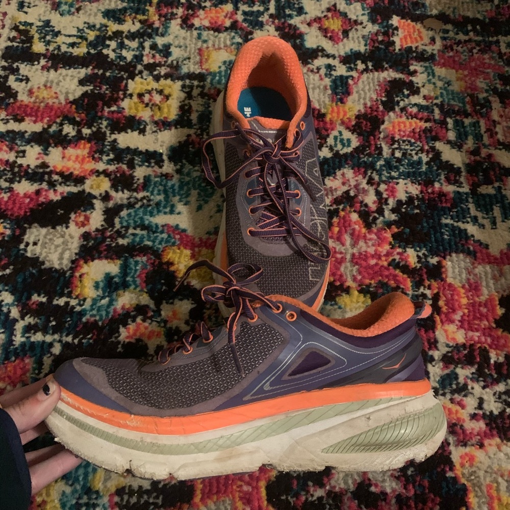 Hokas purple, white, and pink
